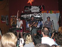 Kevin Steinhauser, Justine Mainville and Zach Burba performing as Math the Band in July 2008. Math the Band 2008.jpg