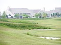 State Park Ferienhäuser, im Vordergrund ein Golfplatz