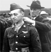 Maynard H. Smith receiving Medal of Honor from Secretary of War Henry L. Stimson Maynard-H-Smith.png