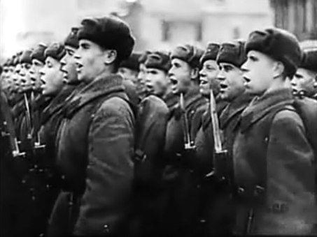 Red Army soldiers cheer Joseph Stalin in Red Square in a scene from the 1942 film Moscow Strikes Back