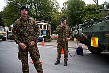 New Zealand Army soldiers manning the red zone cordon on 23 February 2011 at the Hagley Park end of Armagh Street NZ and Singapore Armed Forces Man Cordons - Flickr - NZ Defence Force.jpg
