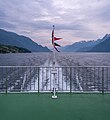 Image 531Norwegian flag hoisted on the Fjorddrott ferry, Sørfjorden, Norway