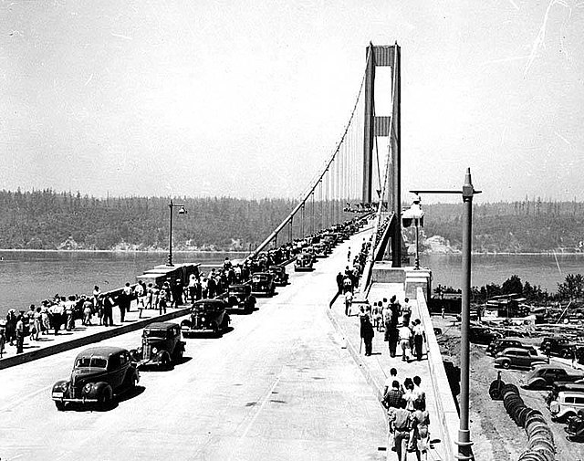 The original Tacoma Narrows Bridge, also known by its nickname of "Galloping Gertie", during its opening on July 1, 1940.