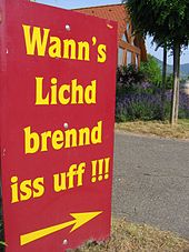 Schild einer Gaststätte in Hainfeld an der Weinstraße