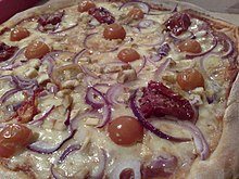 Pizza with tomato, sun-dried tomato and onion.jpg