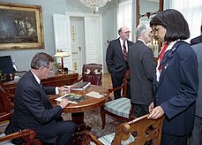 President George H. W. Bush meets with staff including Marlin Fitzwater, Gen Scowcroft, and Condoleezza Rice during the Summit in Helsinki, Finland, President Bush and President Gorbachev subsequently held a press conference to conclude their bilateral summit. President George H. W. Bush meets with staff during the Summit in Helsinki.jpg