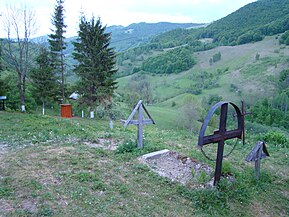 În cimitir