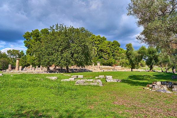 Peribolos wall remains seen in the foreground from the south against the backdrop of the Temple of Hera