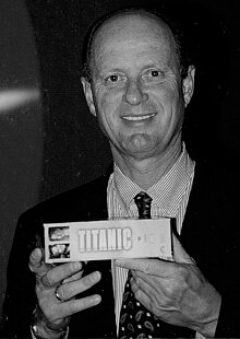 Ballard in 1999 with a VHS copy of the film Titanic Robert Ballard 1999.jpg