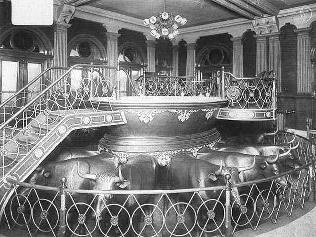 Baptismal font in the Salt Lake Temple, c. 1912, where baptisms for the dead are performed by the LDS Church