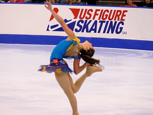 Sasha Cohen performing a combination spin during her short program
