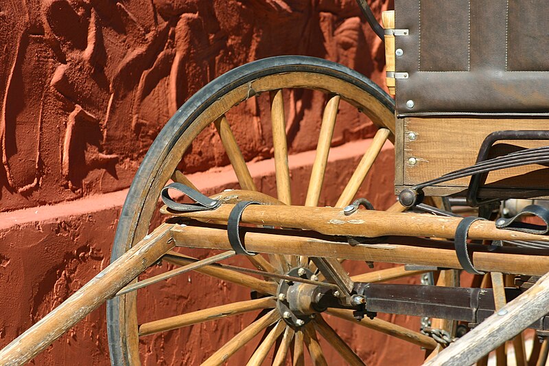 File:Stagecoach Wheel Tombstone.jpg