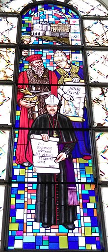 Stained glass depiction of Pope Callixtus III, Skanderbeg and Pal Engjëlli at the Cathedral of Saint Mother Teresa in Prishtina.jpg