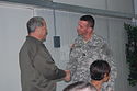 Congressman Steve Israel greets Brian S. Caskey (3-142 Aviation) during Israel's 2008 visit to Iraq. Steve Israel Iraq.jpg