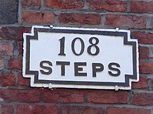 108 steps sign, located on Churchside, at the top of the 108 Steps down to Waters Green.[54]