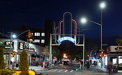The gantry over 46th Street at Queens Boulevard is located in the heart of Sunnyside