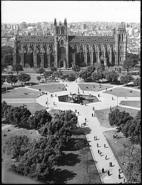 Avenue in Hyde Park, circa 1935, showing St Mary's Cathedral before its spires were added.