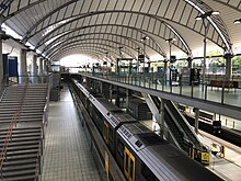 Concourse and platforms Sydney Olympic Park train station (49755055828).jpg