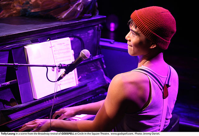 Leung performing in the 2011 Broadway Revival of Godspell