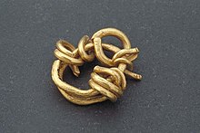 Gold used as raw material for making jewelry or as means of payment. From the Migration Period, Sweden around 400-549 AD. Ten av guld.jpg