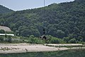 U.S. Army Chief Warrant Officer 2 Byron Clark, the 210th Fires Brigade target officer, jumps from a 62 meter platform in the bungee jump event at the X Game Resort in Inje, Gangwon province, South Korea, June 7 130607-A-WG463-018.jpg