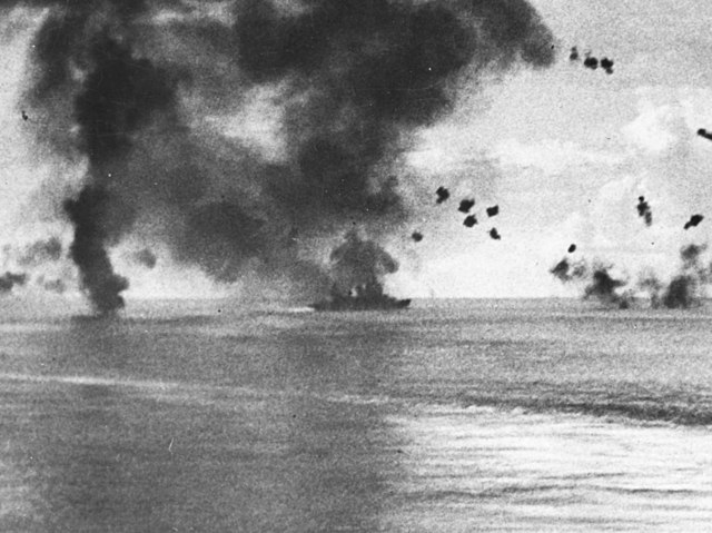 The aftermath of the "Betty" medium bomber crashing into the heavy cruiser San Francisco on 12 November 1942.