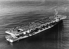 Windham Bay transporting a load of ten Republic F-84 Thunderjets on board her flight deck, along with a single liaison aircraft. Notably, she is shown still carrying her SK-1 radar.