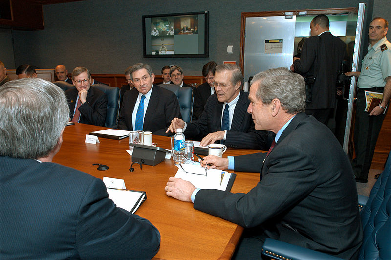 File:US Navy 030325-D-9880W-046 The Honorable Donald H. Rumsfeld, Secretary of Defense (2nd from right), introduces President George W. Bush (right) to participants at a briefing held in the Pentagon.jpg