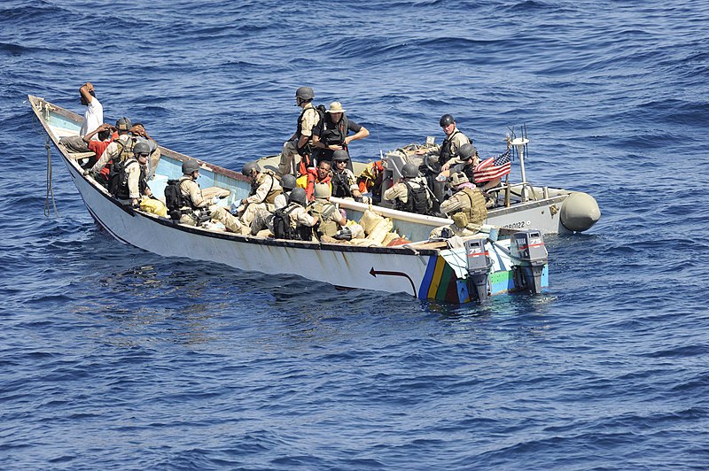 File:US Navy 091015-N-9500T-044 Members of a visit, board, search and seizure team from the guided-missile cruiser USS Anzio (CG 68) and U.S. Coast Guard Maritime Safety and Security Team 91104 search a skiff.jpg