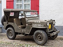 https://upload.wikimedia.org/wikipedia/commons/thumb/4/4e/Willys_M606_Jeep.jpg/220px-Willys_M606_Jeep.jpg