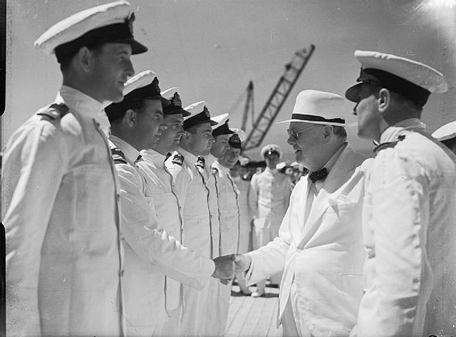 Winston Churchill meets submarine commanders in Algiers aboard Maidstone during the War