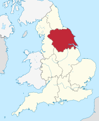 Yorkshire y Humber, resaltados en rojo en un mapa político beige de Inglaterra