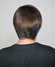 Young man with short brown hair from behind (1 October 2022).jpg