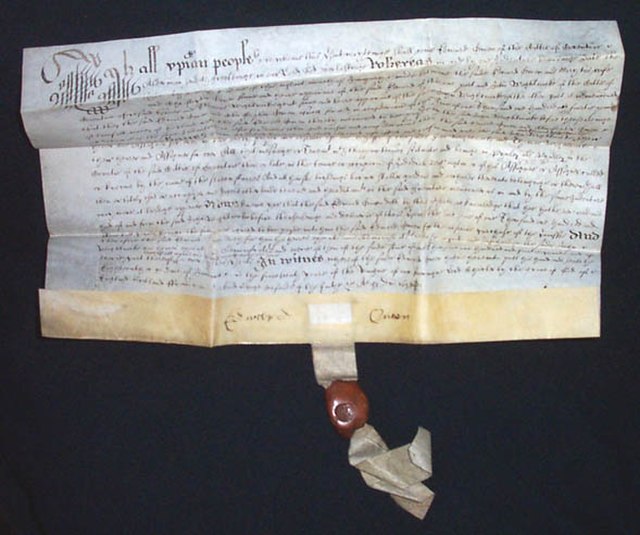 A vellum deed dated 1638, with pendent seal attached