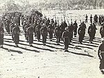 Members of the 2/25th Battalion during the Battalion's fourth anniversary parade in July 1944