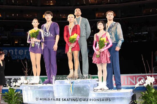 The pairs podium. From left: Zhang Dan / Zhang Hao (2nd), Aliona Savchenko / Robin Szolkowy (1st), Yuko Kavaguti / Alexander Smirnov (3rd).