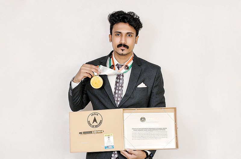 File:Abhilash Suresh with India Book of Record Title.jpg