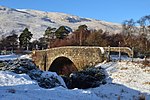 Arch Bridge in the Snow at Kildonan, Sutherland (geograph 6718707).jpg