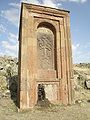 Huge 13th-century khachkar monument located behind the church across the small ravine.