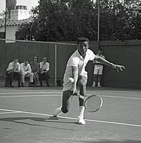 Arthur Ashe won 4 singles titles. Arthur Ashe 1964.jpg