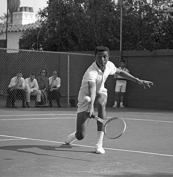 Ashe playing against Dennis Ralston at the 1964 Southern California Intercollegiates.