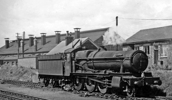 Ex-GW 6851 'Hurst Grange' 4-6-0 outside Basingstoke Locomotive Depot 24 July 1965.