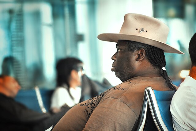 File:Black male donning a cowboy hat.jpg - Wikimedia Commons