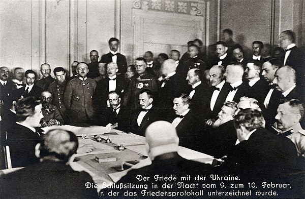 Signing of the Peace Treaty of Brest-Litovsk during the night of 9-10 February 1918. Sitting in the middle from the left: Count Ottokar Czernin, Richa