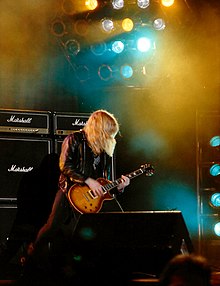 Guitarist Buren Fowler performing with the band in 1992 Buren 3.jpg