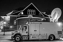 CNN broadcasting van outside of the fourth forum CNN Democratic Forum (24006753794).jpg