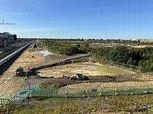 Construction of the Cambridge South railway station as of 9 August 2023. Cambridge South rail station.jpg