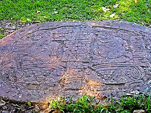 Carved altar at Maya site of Caracol, Belize, showing captives from Bital and Ucanal.jpg