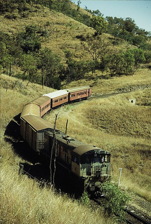 QR loco 1732 hauls a special train on the Drummond Range section, near Bogantungan, September 1989