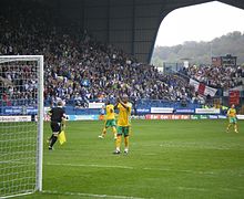 Dion applauds Norwich City fans before kick-off in his final appearance for the Canaries, Hillsborough, 4 May 2008 Dion hillsborough 2008 05 04.jpg